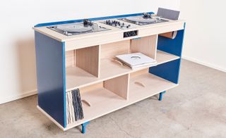 wooden and blue painted DJ deck and with open shelves