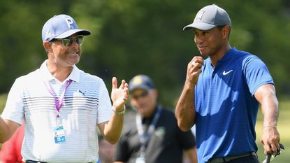 Claude Harmon III with Tiger Woods