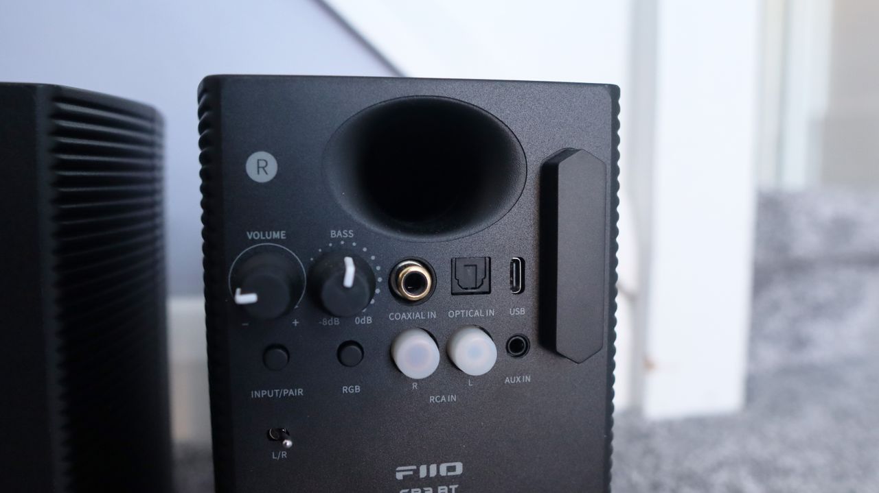 FiiO SP3 BT computer speakers set up on the floor.