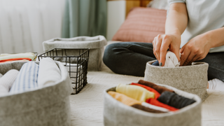 Woman folding clothes