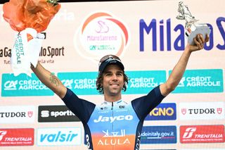 Team Jayco Alula's Australian rider Michael Matthews celebrates on the podium after the 115th Milan-SanRemo one-day classic cycling race, between Pavia and SanRemo, on March 16, 2024. (Photo by Marco BERTORELLO / AFP)