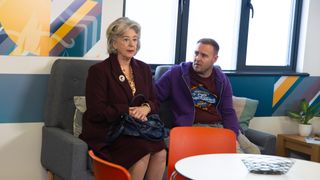 Evelyn Plummer looks nervous as Tyrone Dobbs sits next to her.