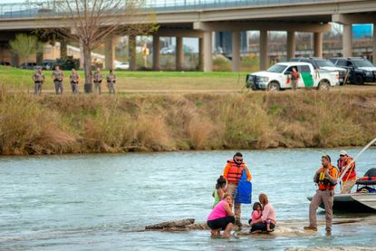 Mexican officials rescue migrants trying to cross into Texas