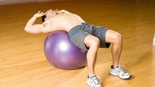 Gym ball twist crunch