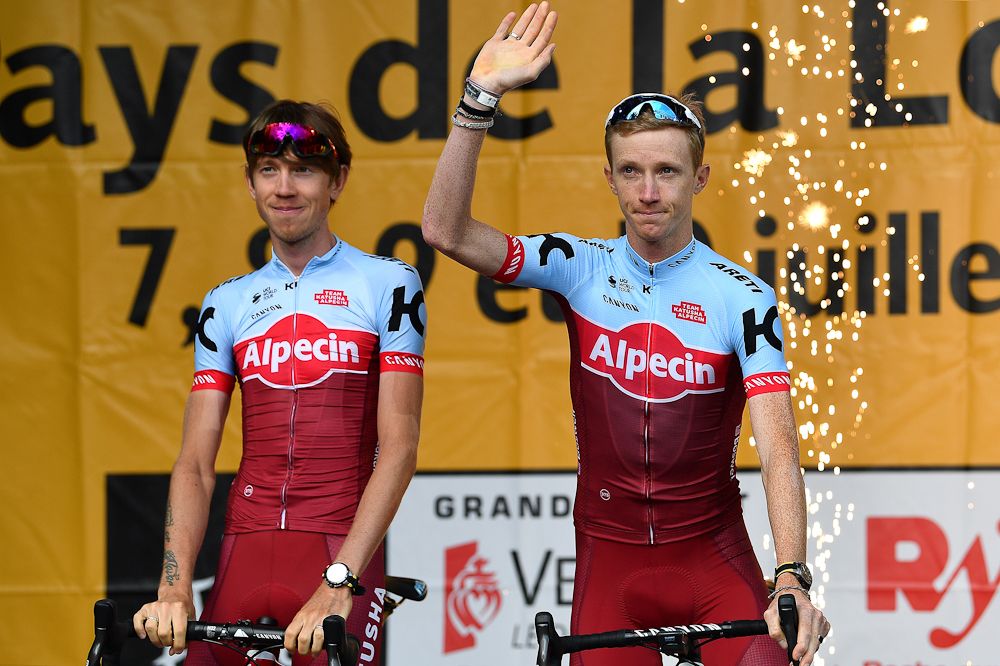 Ilnur Zakarin and Ian Boswell greet the crowd at the 2018 Tour de France team presentation