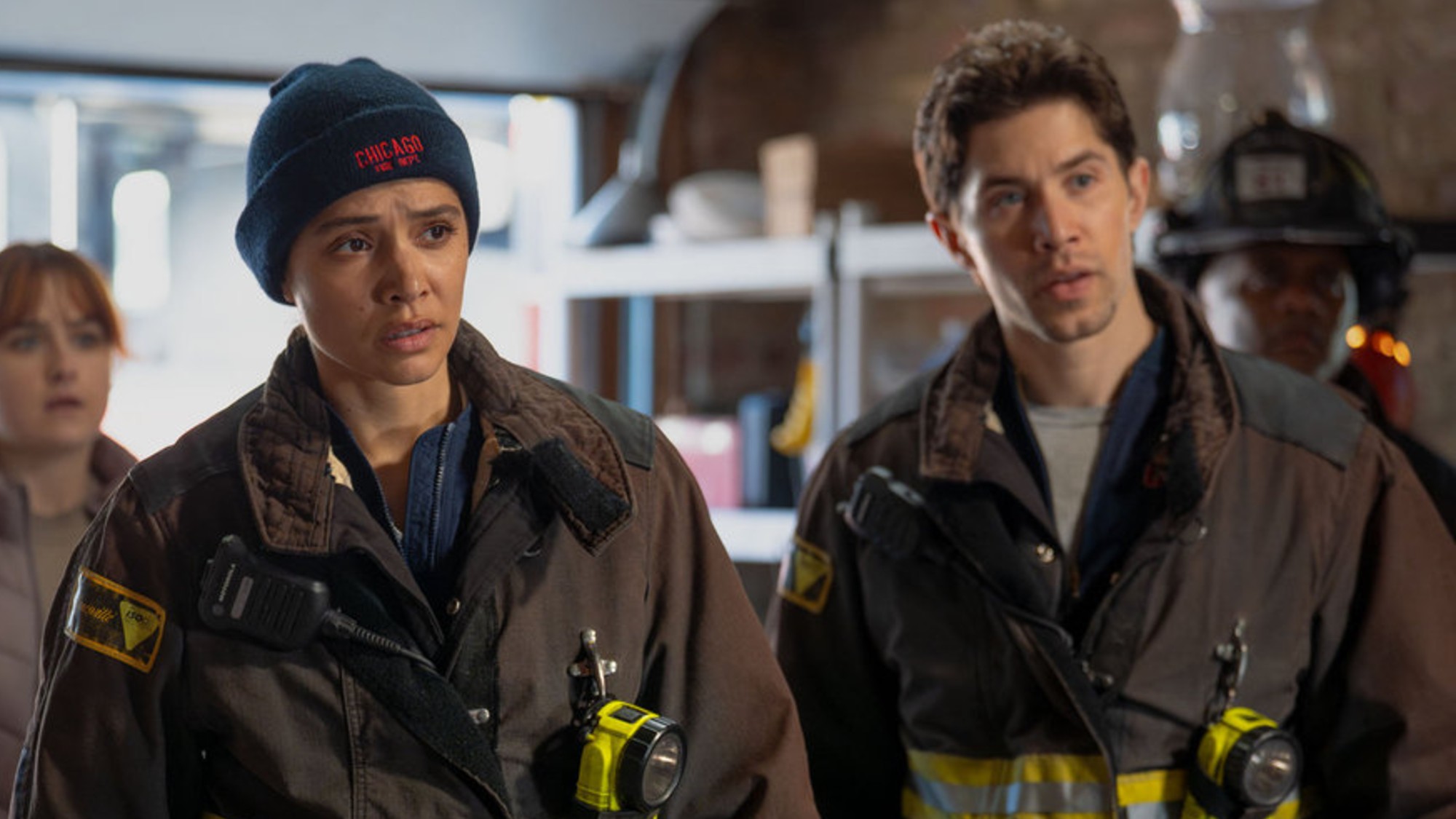 Kidd and Vasquez standing next to each other in uniform on Chicago Fire.