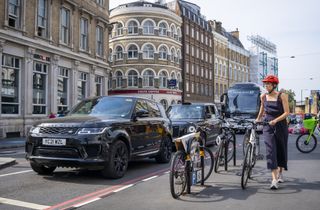 Cyclist alongside traffic in London