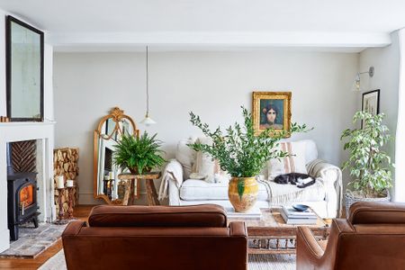 White relaxed living room with plants 