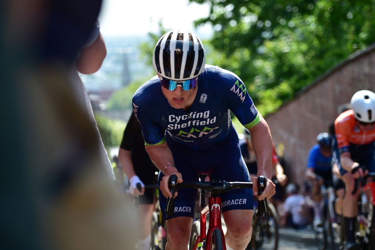 A rider in Cycling Sheffield kit