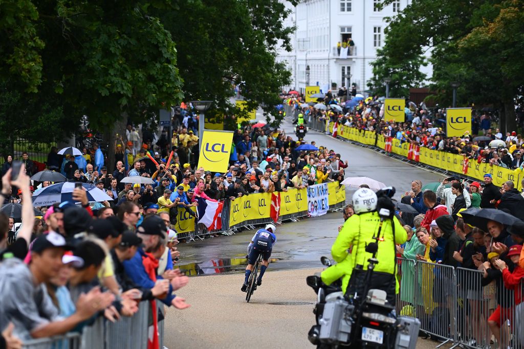 COPENHAGEN DENMARK JULY 01 Yves Lampaert of Belgium and QuickStep Alpha Vinyl Team sprints while fans cheer during the 109th Tour de France 2022 Stage 1 a 132km individual time trial stage from Copenhagen to Copenhagen ITT TDF2022 WorldTour on July 01 2022 in Copenhagen Denmark Photo by Tim de WaeleGetty Images