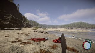 Sons of the Forest machete - a view of a sandy beach with two deflated dinghys near the waves and forested hills in the background