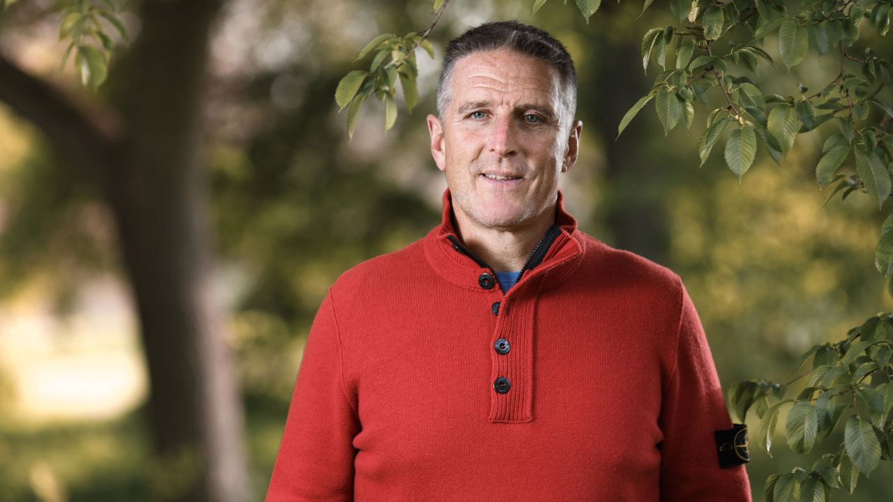 Iolo Williams in a bright red jumper for Autumnwatch 2022