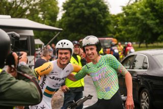 Australian road and time trial champion Luke Plapp (Jayco-AlUla) with Australian U23 road race champion Fergus Browning (Trinity) enjoying the camaraderie of the race at the stage 2 time trial at the 2024 Tour of Bright