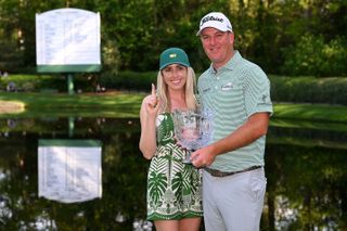 Tom Hoge and his wife Kelly with the Masters Par 3 contest trophy