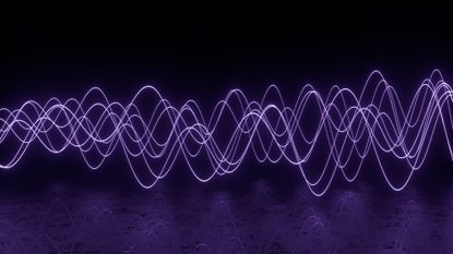 An illustration of purple waves to represent electromagnetism 