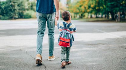 Picture of father walking with his son