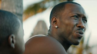 Mahershala Ali talking to a child in Moonlight.