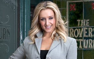 Cartherine Tyldesley as Eva Price outside the Rovers in Coronation Street