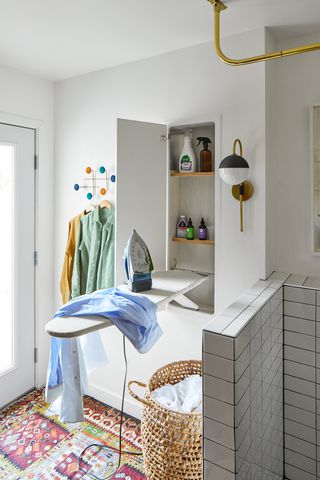 laundry room with built in cupboards