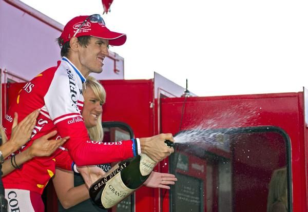 Estonia's Rein Taaramae uncorks the champagne following his first-ever Grand Tour stage win.