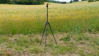 A Vanguard Veo 3T 235CBP tripod pictured in a field