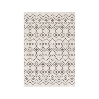 geometric outdoor rug with a brown pattern on cream 