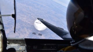 A U.S. Air Force pilot looked down at the suspected Chinese surveillance balloon as it hovered over the Central Continental United States February 3, 2023.