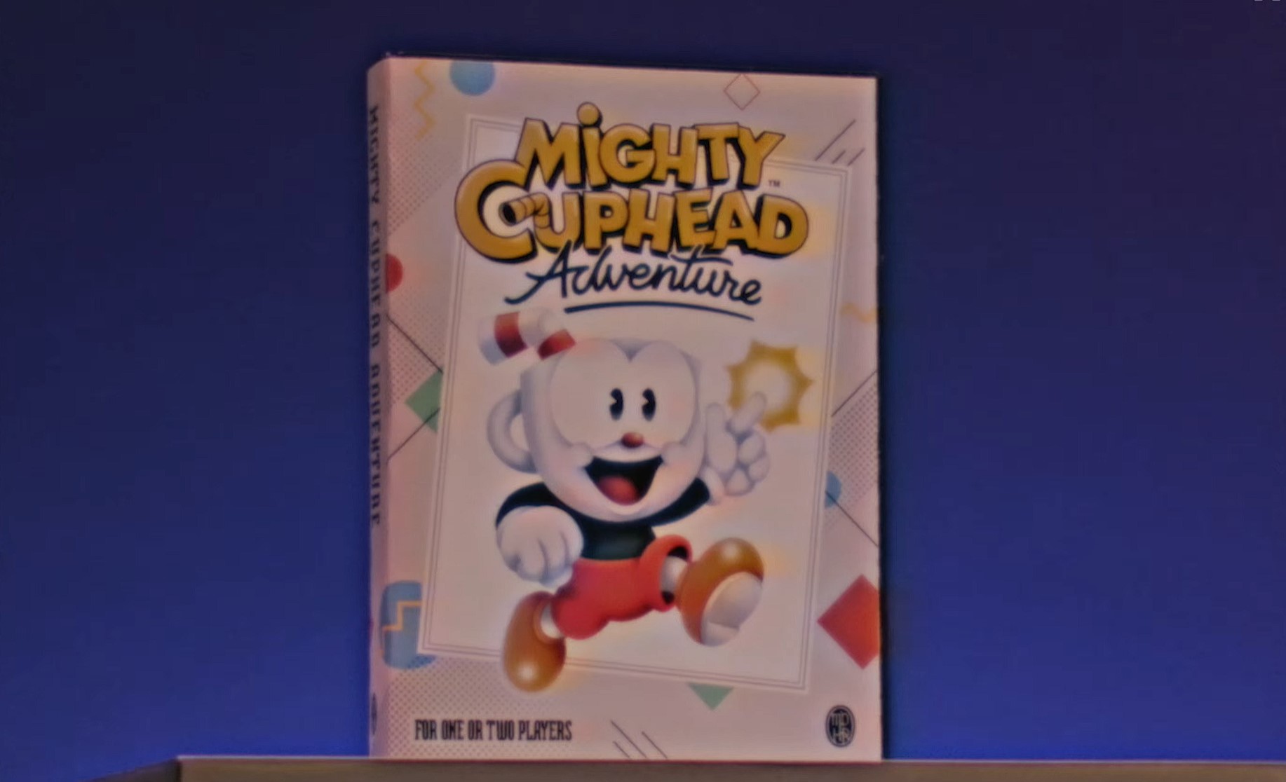 A box with "Mighty Cuphead Adventure" on it.