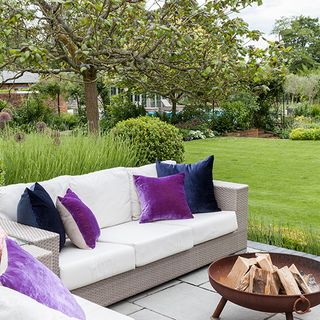 patio with sofa set with cushions