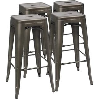 A set of four metal bar stools