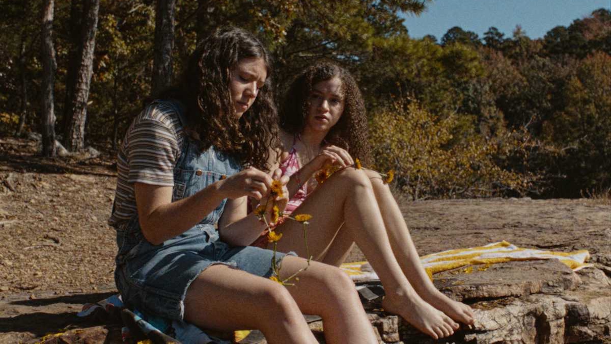 Katherine Mallen Kupferer and Chloe Coleman sitting together in Mouse