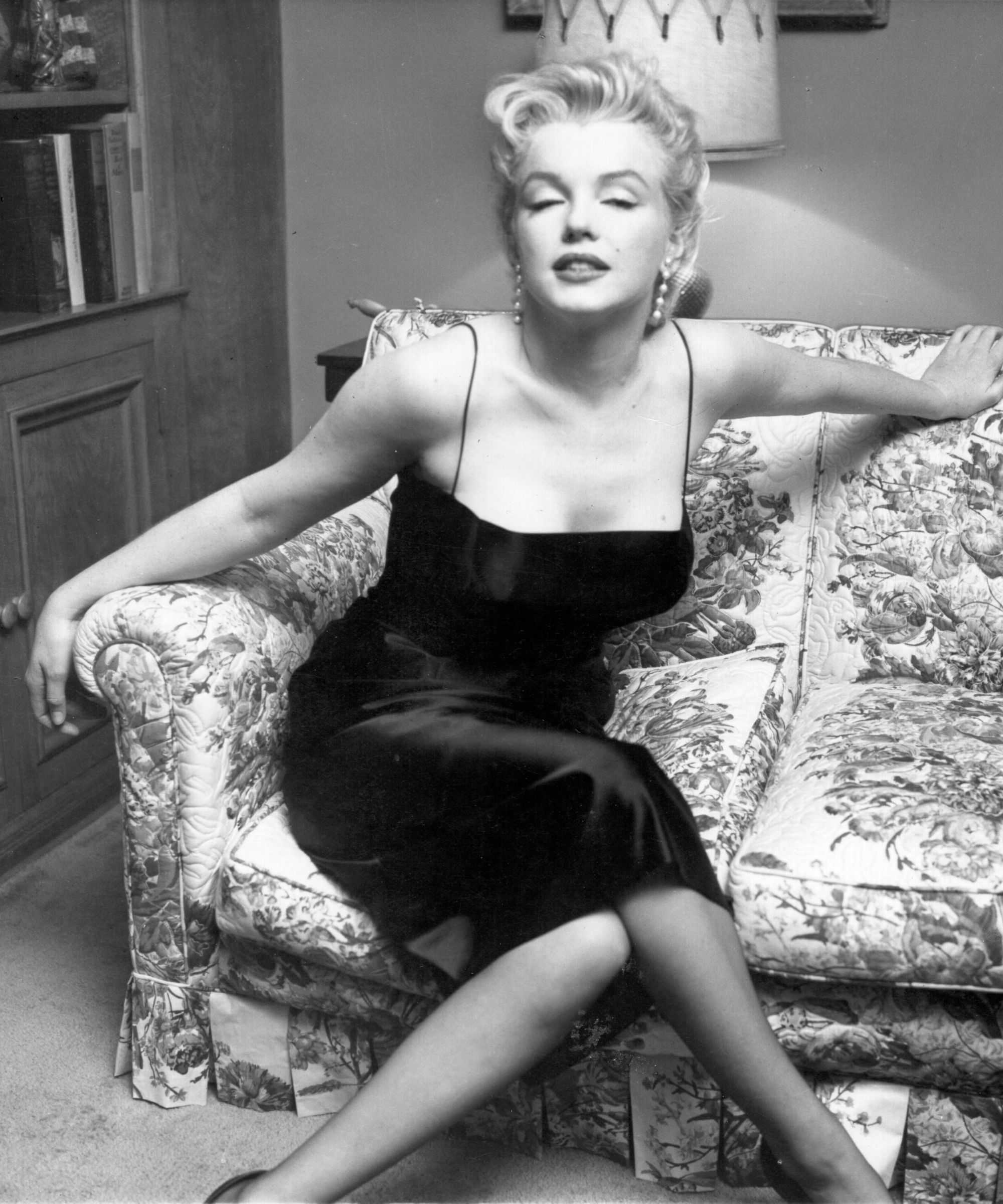 marilyn monroe on her floral sofa