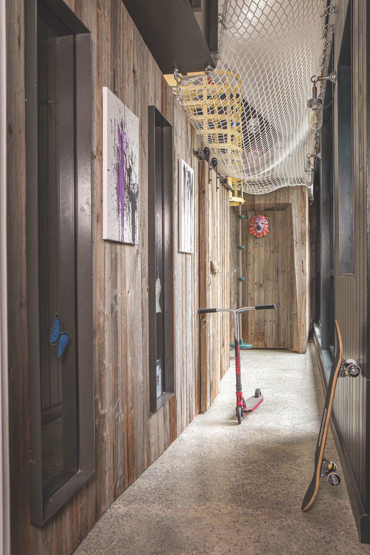 hallway with timber cladding and net ceiling