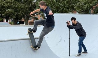 3 Legged Thing Lance monopod being used by a photographer in a skatboard park