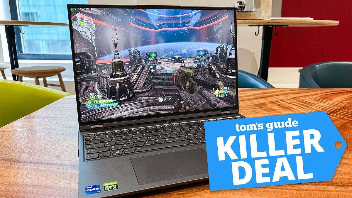 Lenovo Legion 5i gaming laptop on a desk with a killer deal tag superimposed