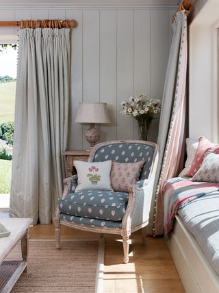 country living room ideas with vintage inspired armchair