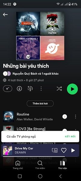 New microphone icon appearing in a Spotify playlist.