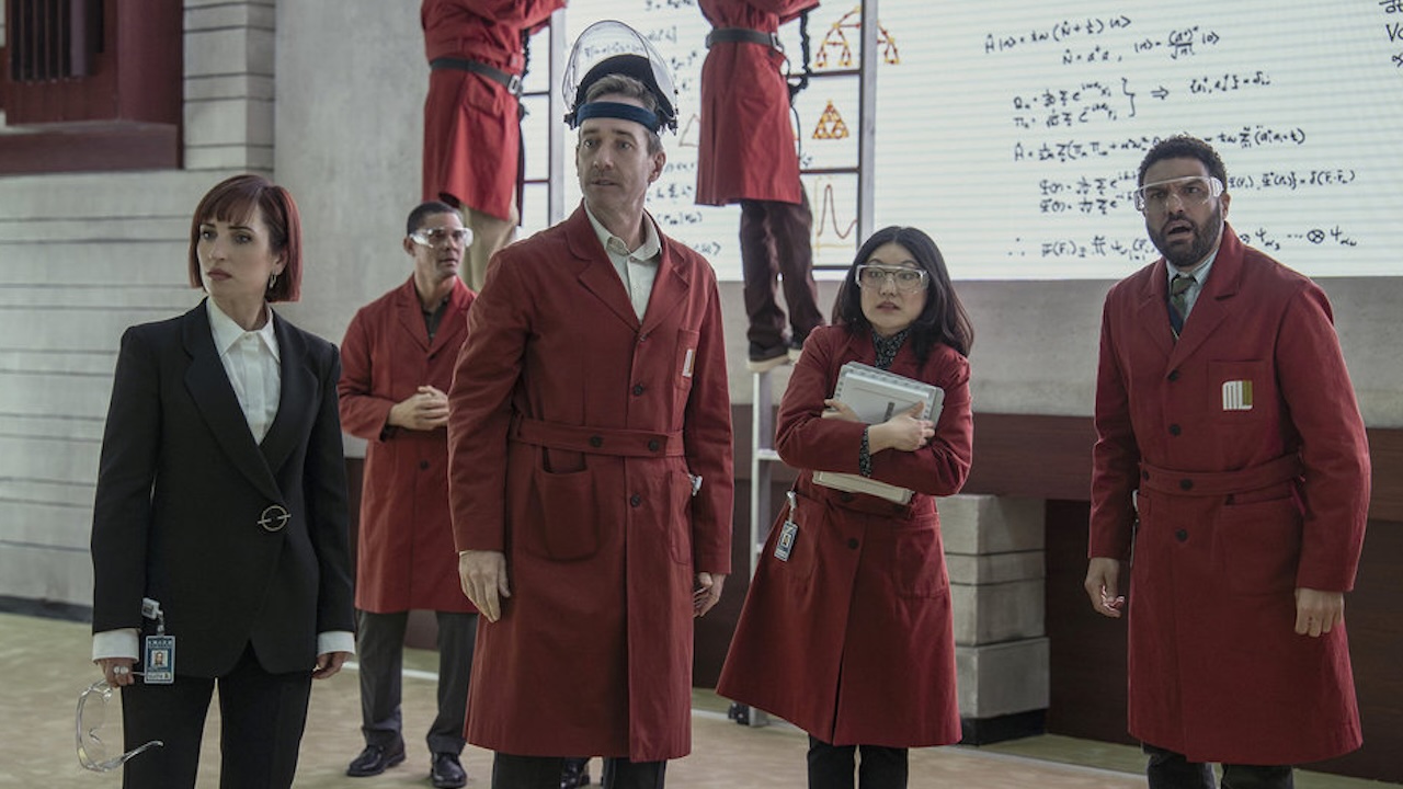 Scientists standing together in The Miniature Wife