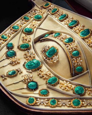 An original parure or jewellery set owned by the Empress featuring pearls and malachite cameos of Greek gods