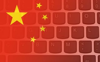 Chinese flag superimposed on a laptop keyboard