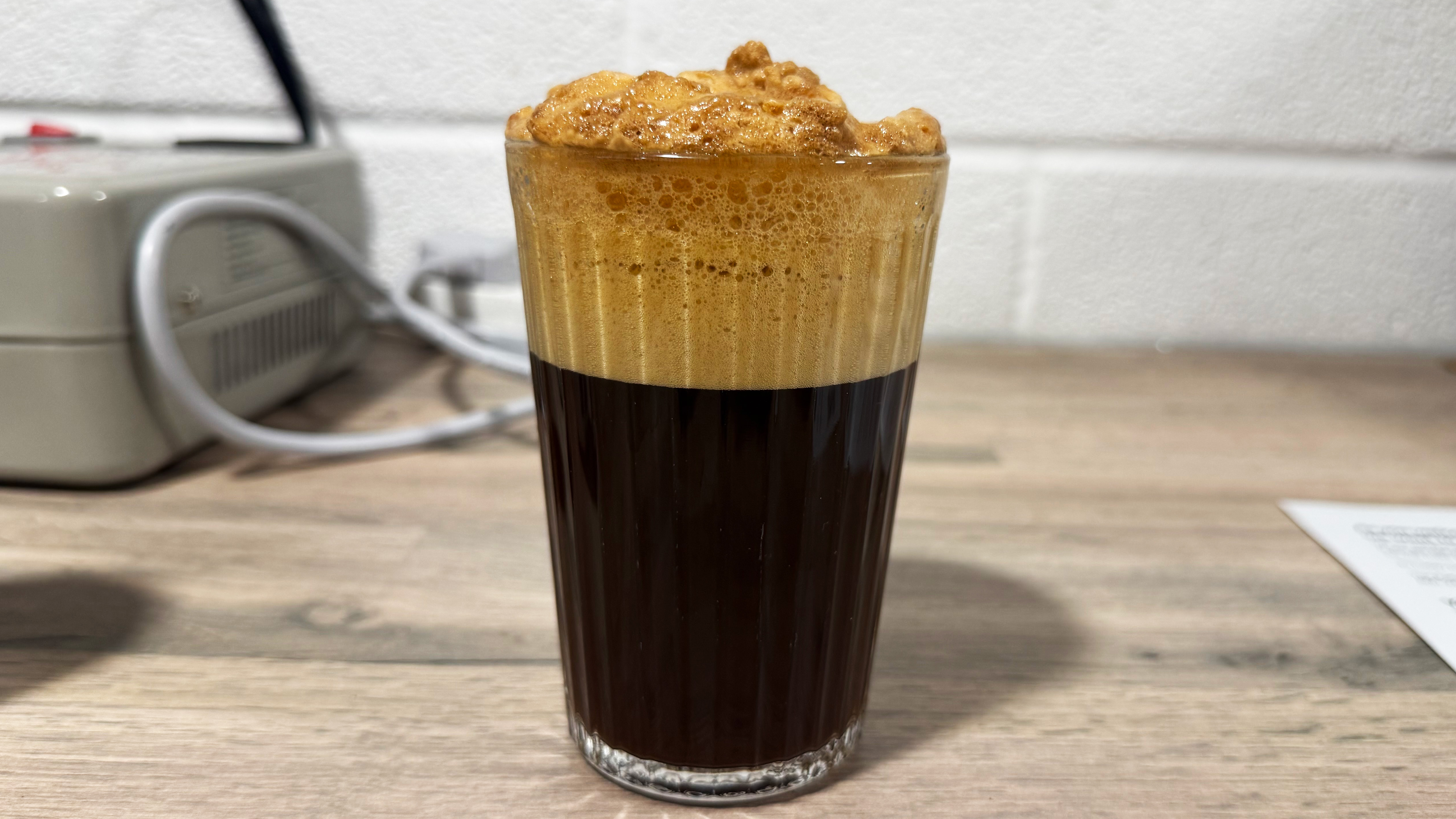 a photo of the viral fridge cigarette coffee + diet coke being made