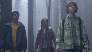 Grover, Annabeth, and Percy stand in a foggy forest in Percy Jackson and the Olympians' TV series
