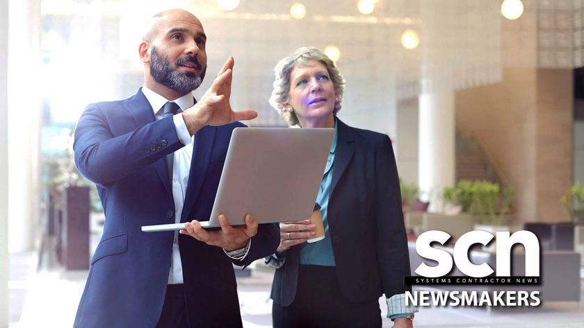 A man and a women ponder the future looking at a laptop screen. 