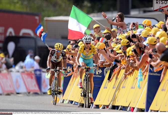 Vincenzo Nibali (Astana) and Jean-Christophe Peraud (Ag2r-La Mondiale) race to the stage 14 finish line in Risoul