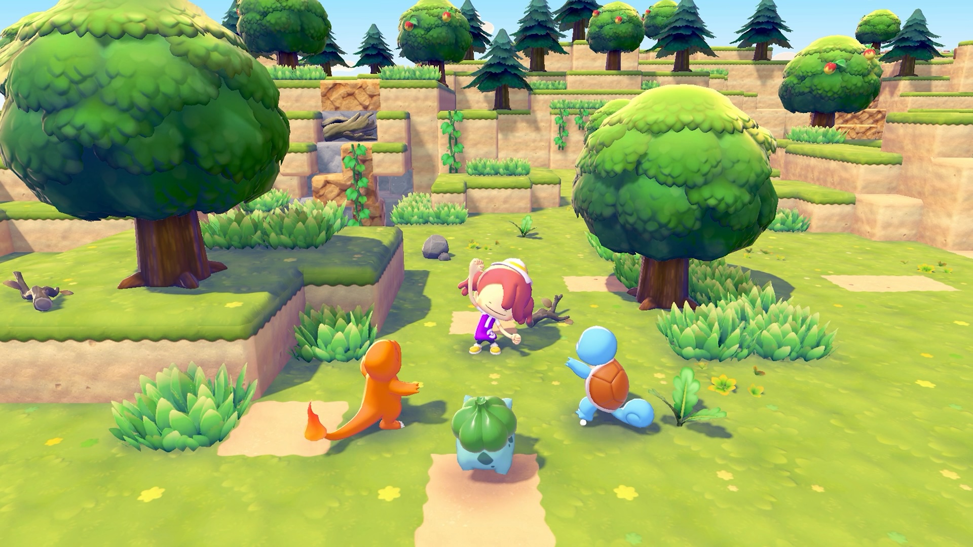 Pokemon Pokopia screenshot showing Charmander, Bulbasaur, and Squirtle all gathered around a Ditto in human form between two green trees