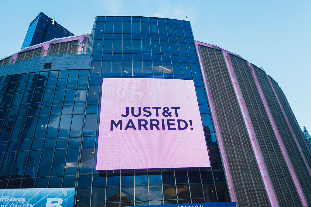 The screens display &amp;quot;Just T&amp;amp;T Married!&amp;quot; outside Madison Square Garden in New York, where Taylor Swift and Travis Kelce's wedding was