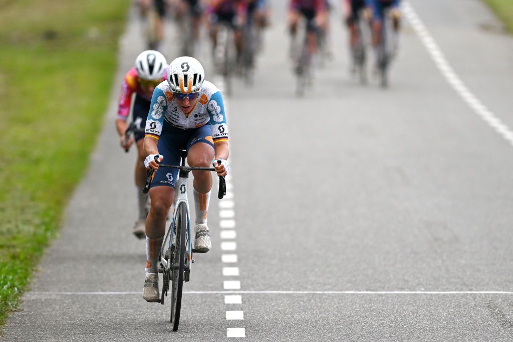 ZEEWOLDE NETHERLANDS OCTOBER 10 Franziska Koch of Germany and Team dsmfirmenich PostNL attacks in the breakaway during the 26th Simac Ladies Tour 2024 Stage 3 a 1484km stage from Zeewolde to Zeewolde UCIWWT on October 10 2024 in Zeewolde Netherlands Photo by Luc ClaessenGetty Images