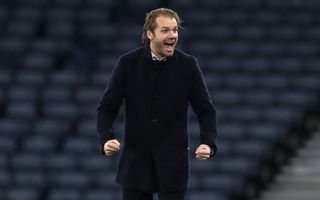 Hearts manager Robbie Neilson celebrates after beating Hibs in the semi-finals