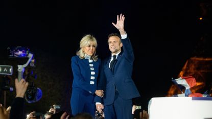 Emmanuel Macron and his wife, Brigitte, celebrate his victory in Paris