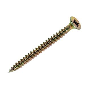 Long gold screw with the pointy end pointed towards the left corner on a white background
